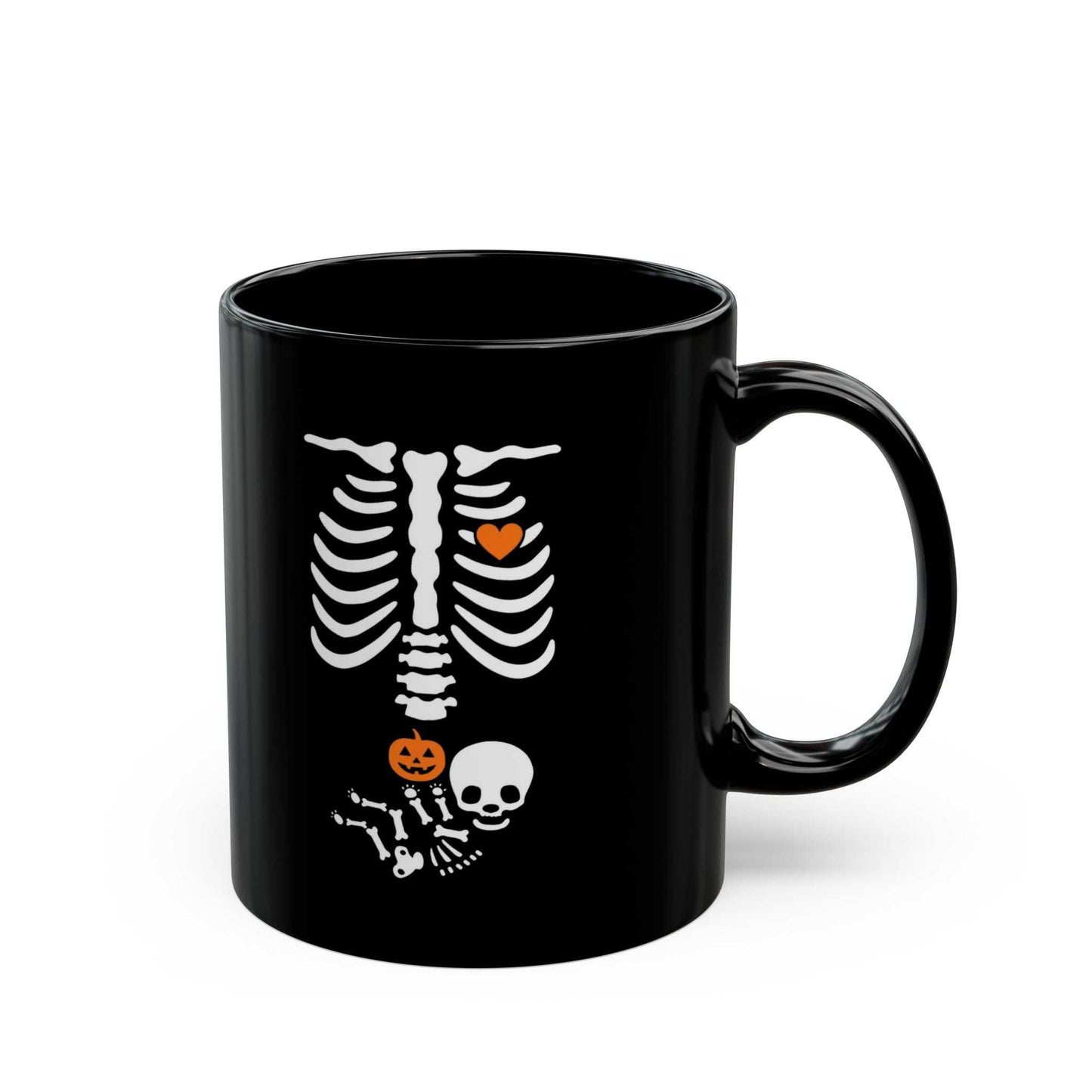 Black ceramic mug featuring skeleton design, perfect for Halloween maternity gifts and pregnancy reveals.