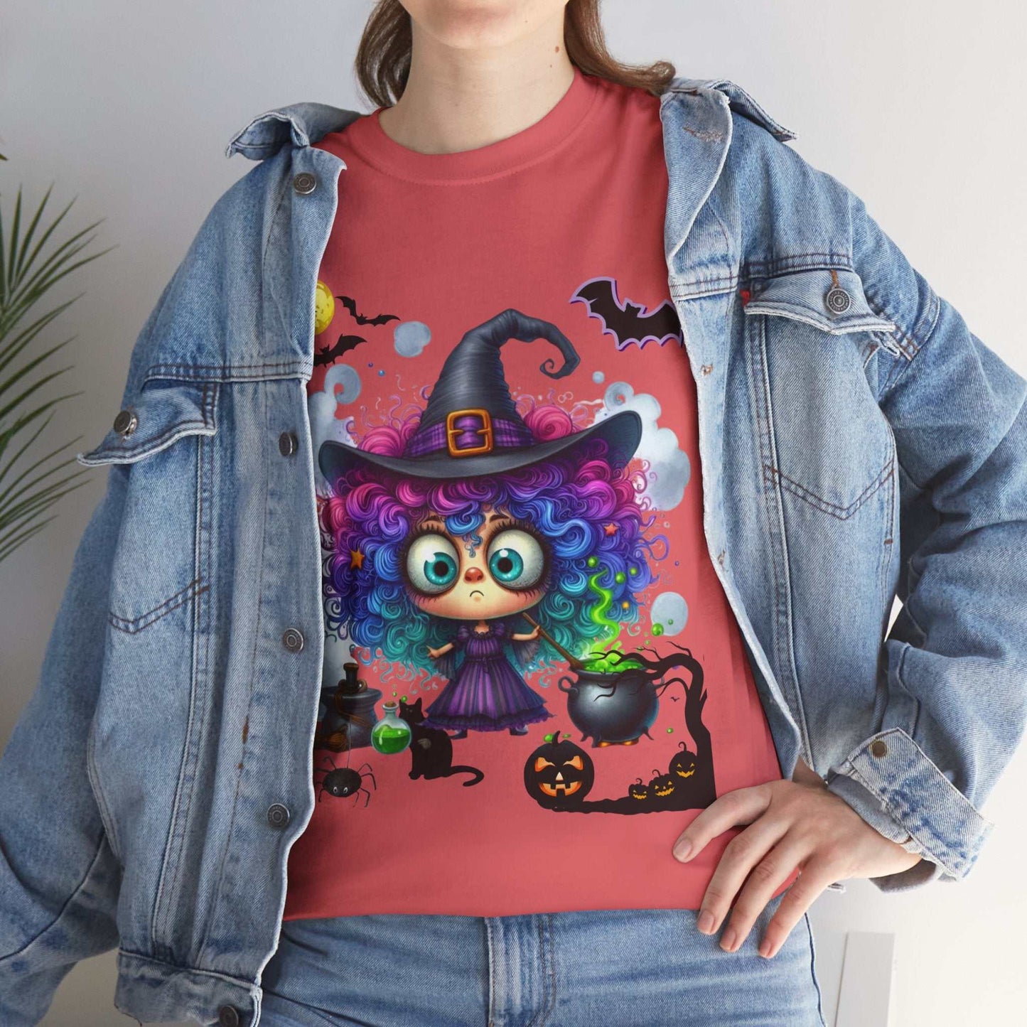 Halloween girl shirt with a colorful witch design, perfect for spooky season.