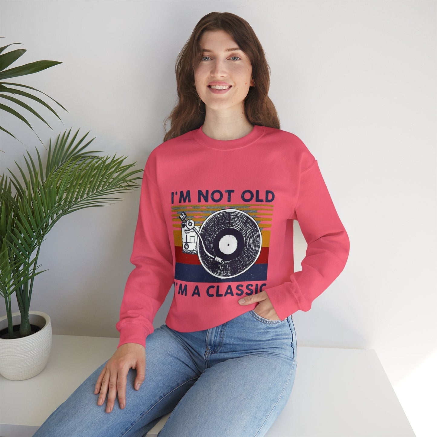 Unisex crewneck sweatshirt with "I'm Not Old I'm a Classic" design, highlighting a vintage record print, ideal for casual wear and gifting, made from a comfortable cotton-polyester blend.