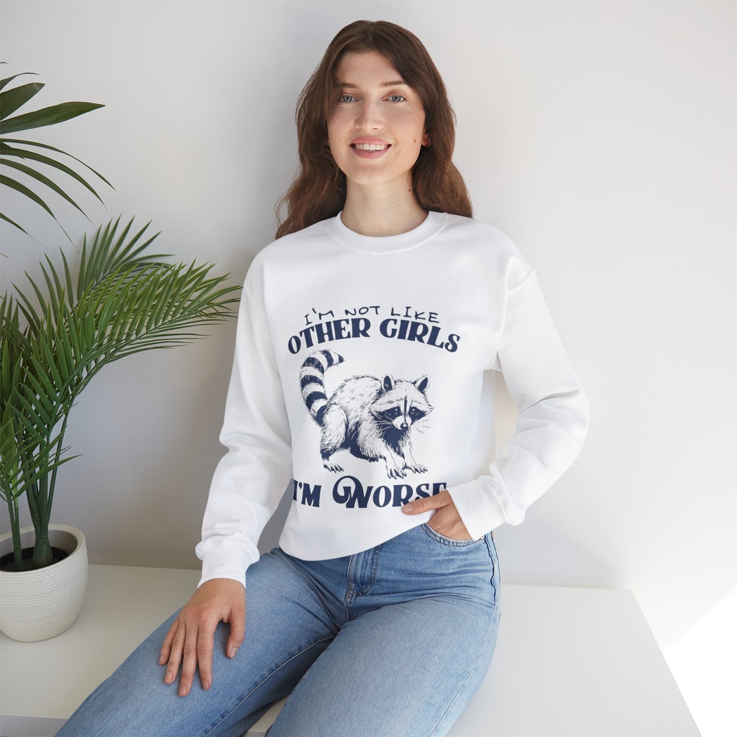Unisex funny raccoon sweatshirt featuring "I'm Not Like Other Girls, I'm Worse" design; cozy crewneck for casual wear.