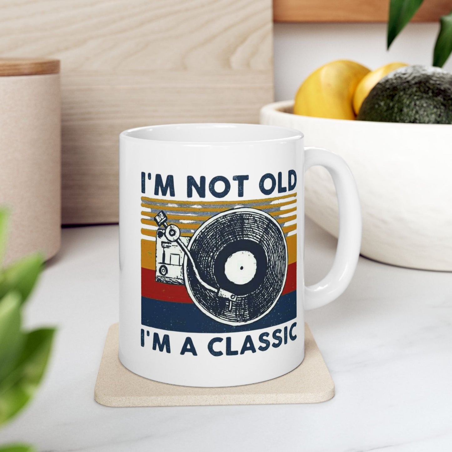 Vintage-Inspired Ceramic Mug with "I'm Not Old, I'm A Classic" design, featuring vibrant colors and whimsical patterns, available in 11oz and 15oz.