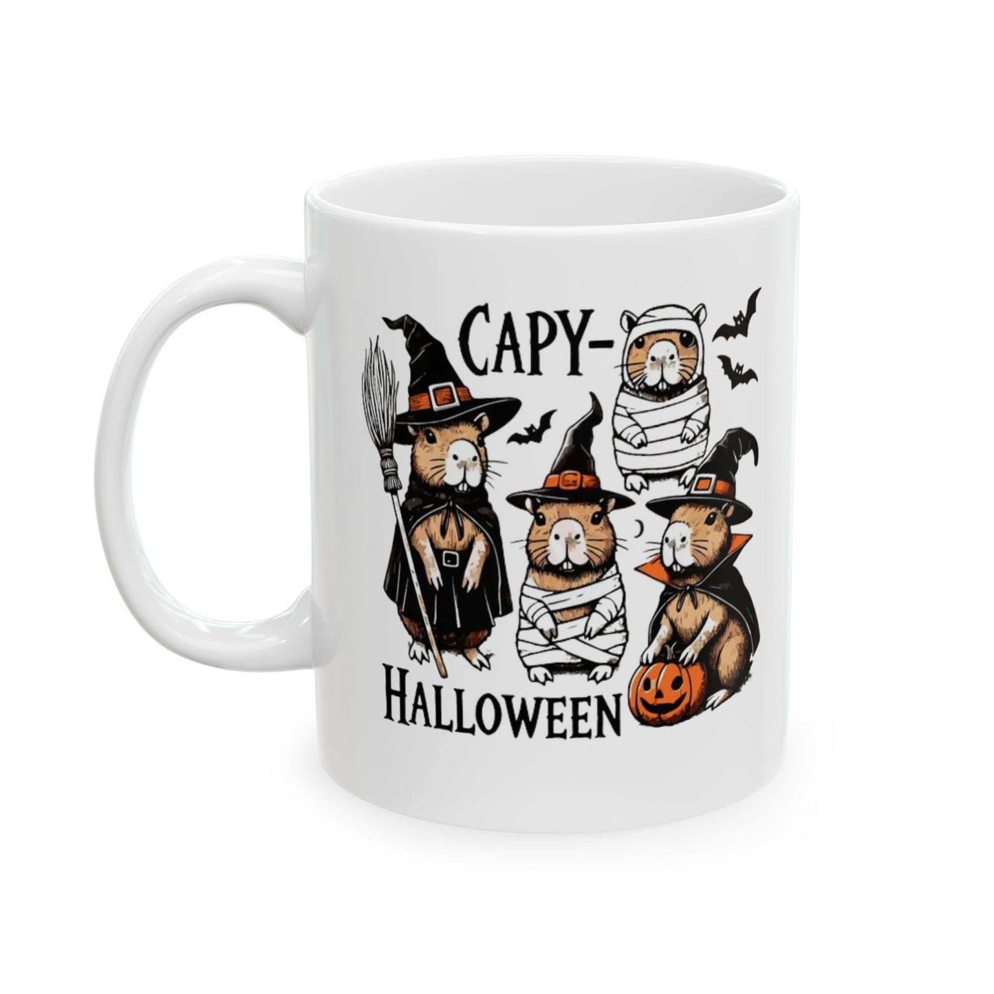 Halloween-themed capybara mug with whimsical capybara illustrations in costumes including witches and mummies, surrounded by bats and a pumpkin, perfect for a spooky coffee experience.