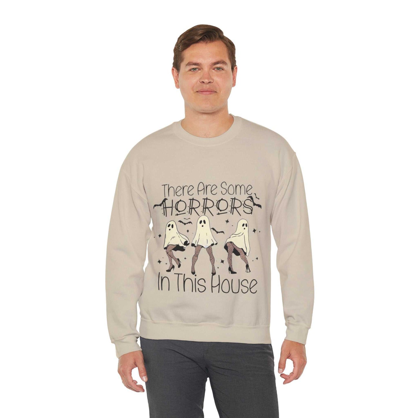 Funny Halloween sweatshirt with "There are some horrors in this house" design, featuring playful ghosts.