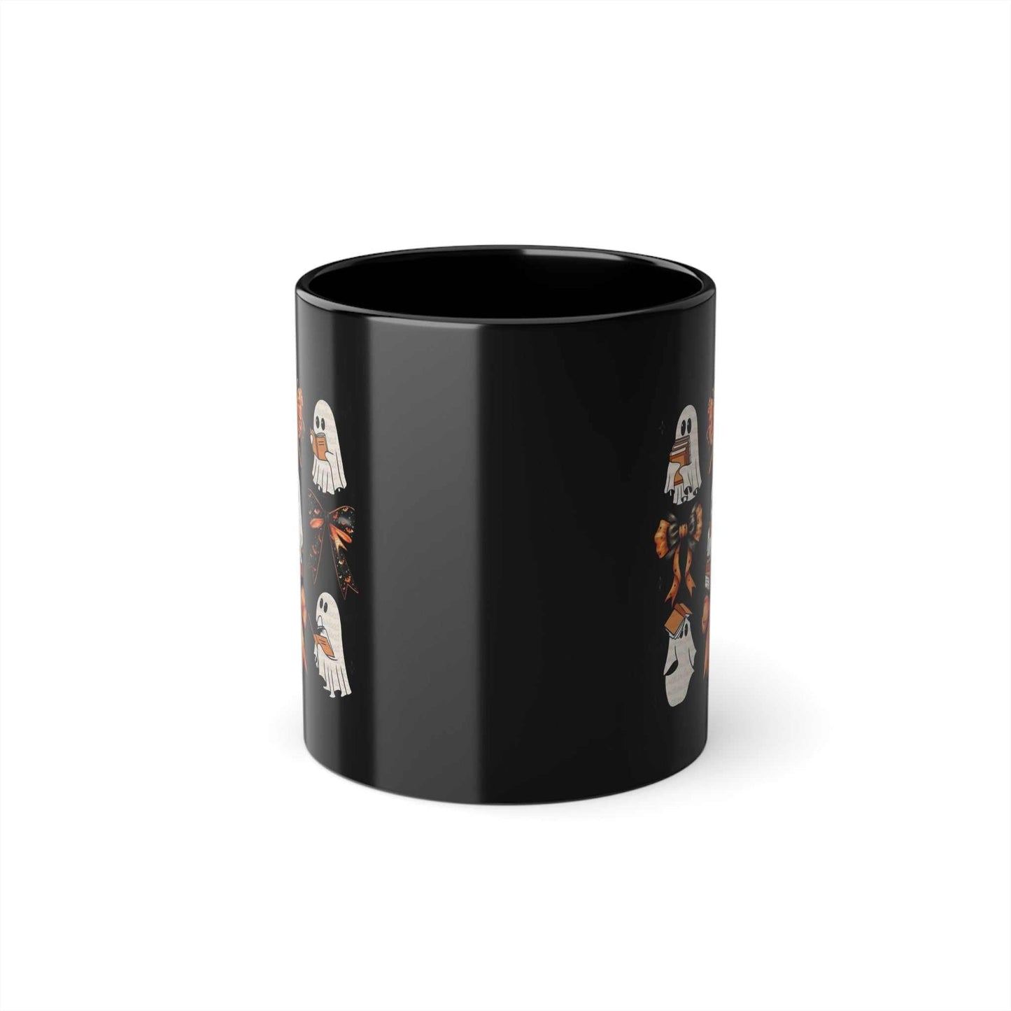 Black ceramic mug featuring ghost and book design for Halloween.