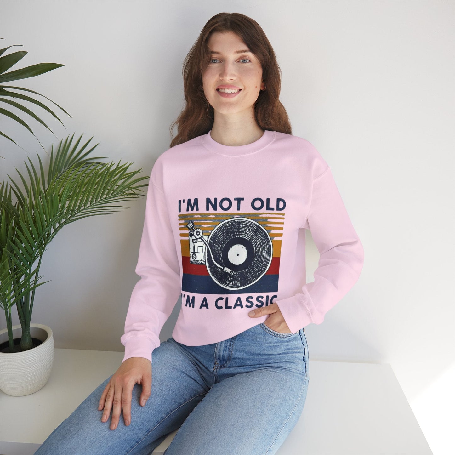 Unisex crewneck sweatshirt with "I'm Not Old I'm a Classic" vintage-inspired design.