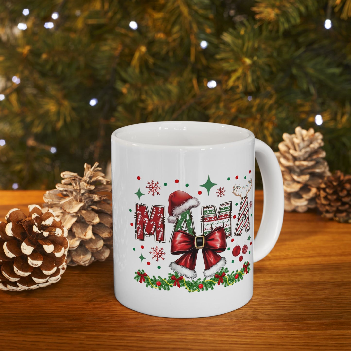 Christmas Mama mug with festive design on wooden table in front of decorated Christmas tree.