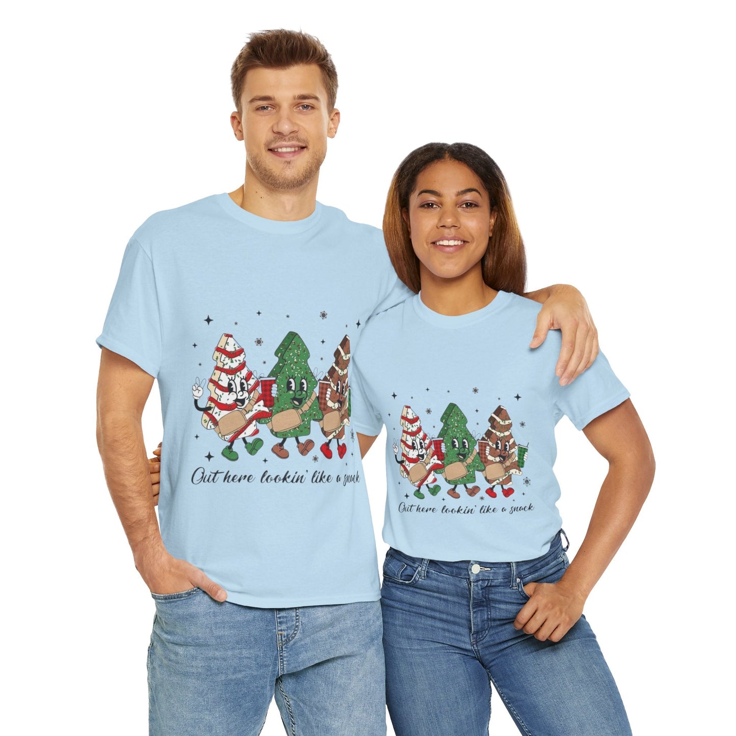 Two people wearing "Out Here Looking Like a Snack Shirt" with festive Christmas design; perfect holiday gift.