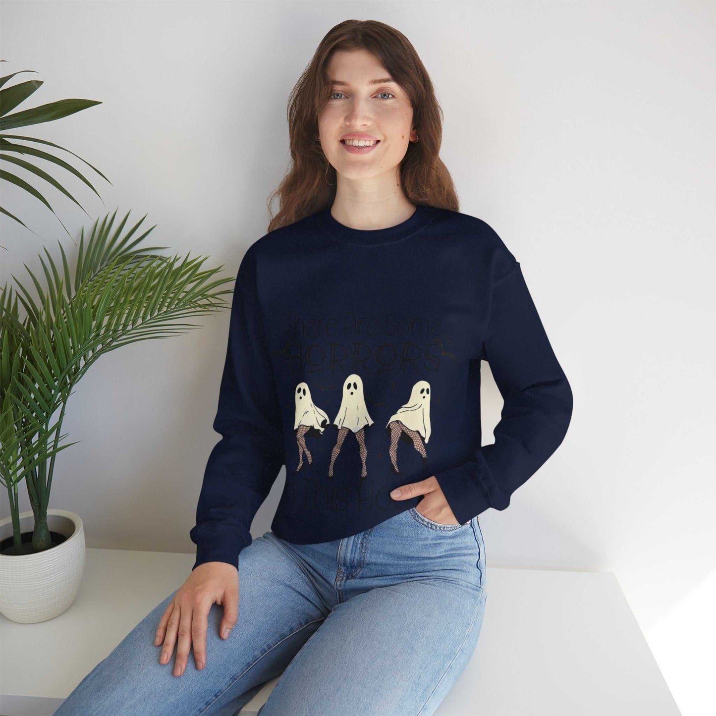 Unisex funny Halloween sweatshirt featuring ghost designs, perfect for a festive and comfortable look.
