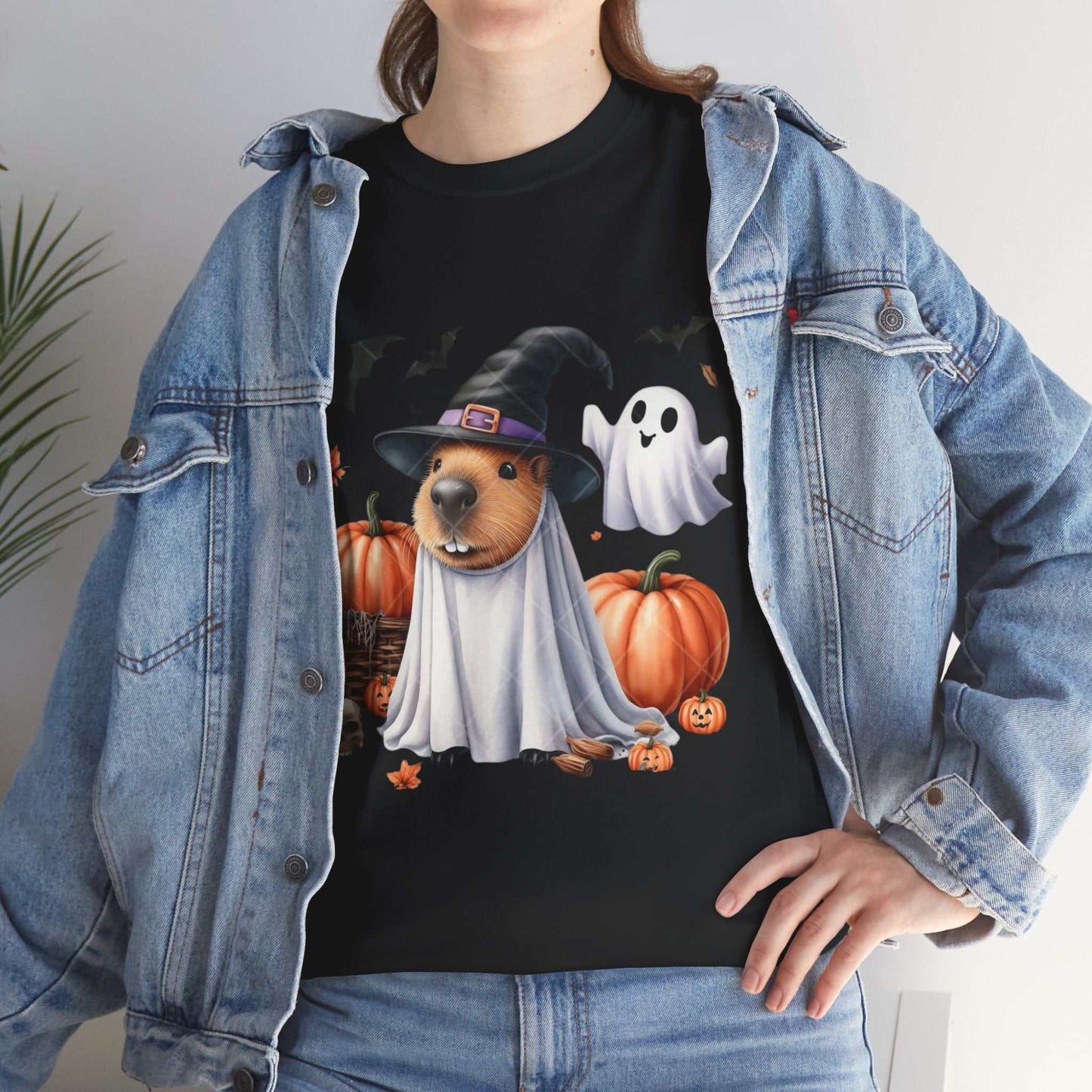 Halloween Capybara Shirt with ghost and pumpkins design.
