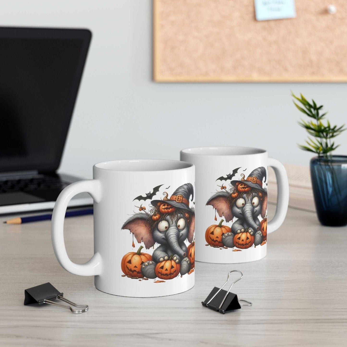 Funny Elephant Halloween mugs featuring cute elephant in witch hat with pumpkins, BPA-free ceramic, available in 11oz and 15oz sizes.