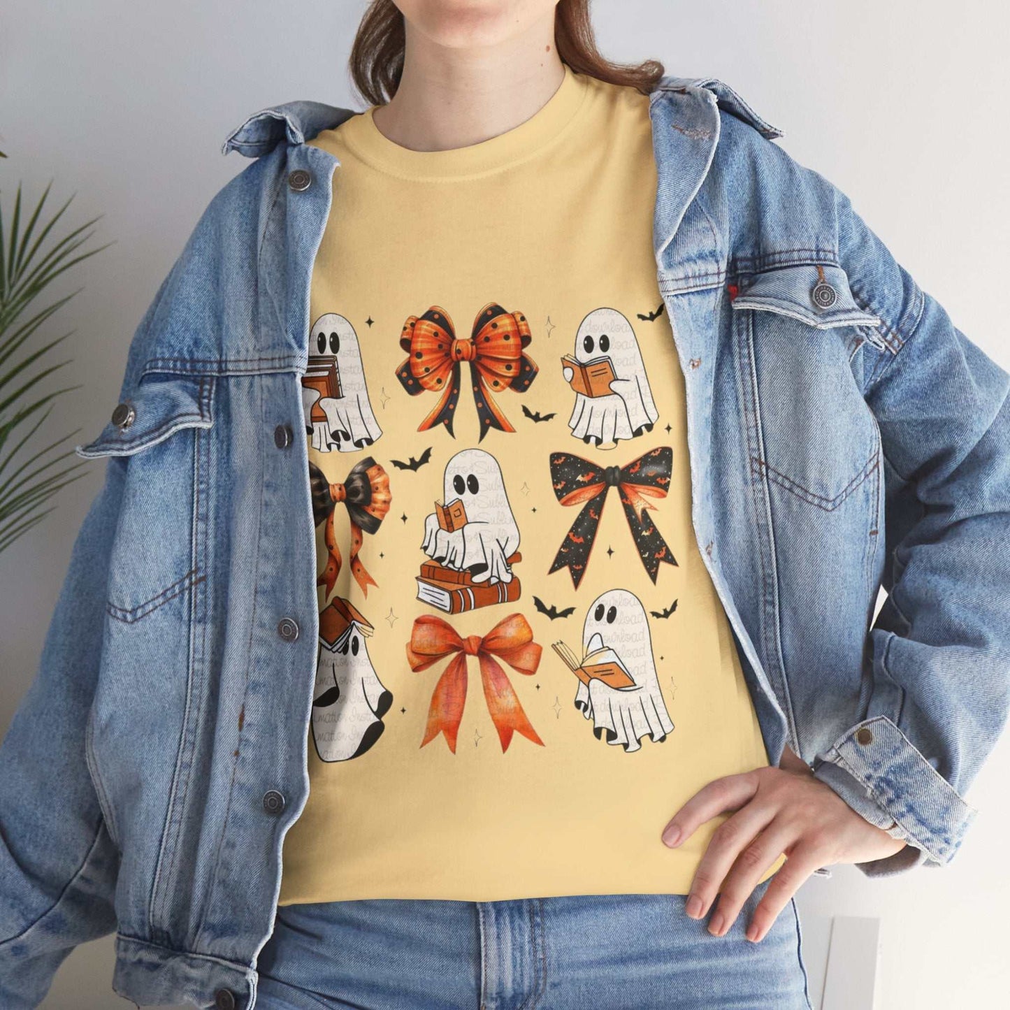Unisex Book Ghost Halloween Shirt featuring cute ghost designs with bows and books, perfect for festive casual wear.