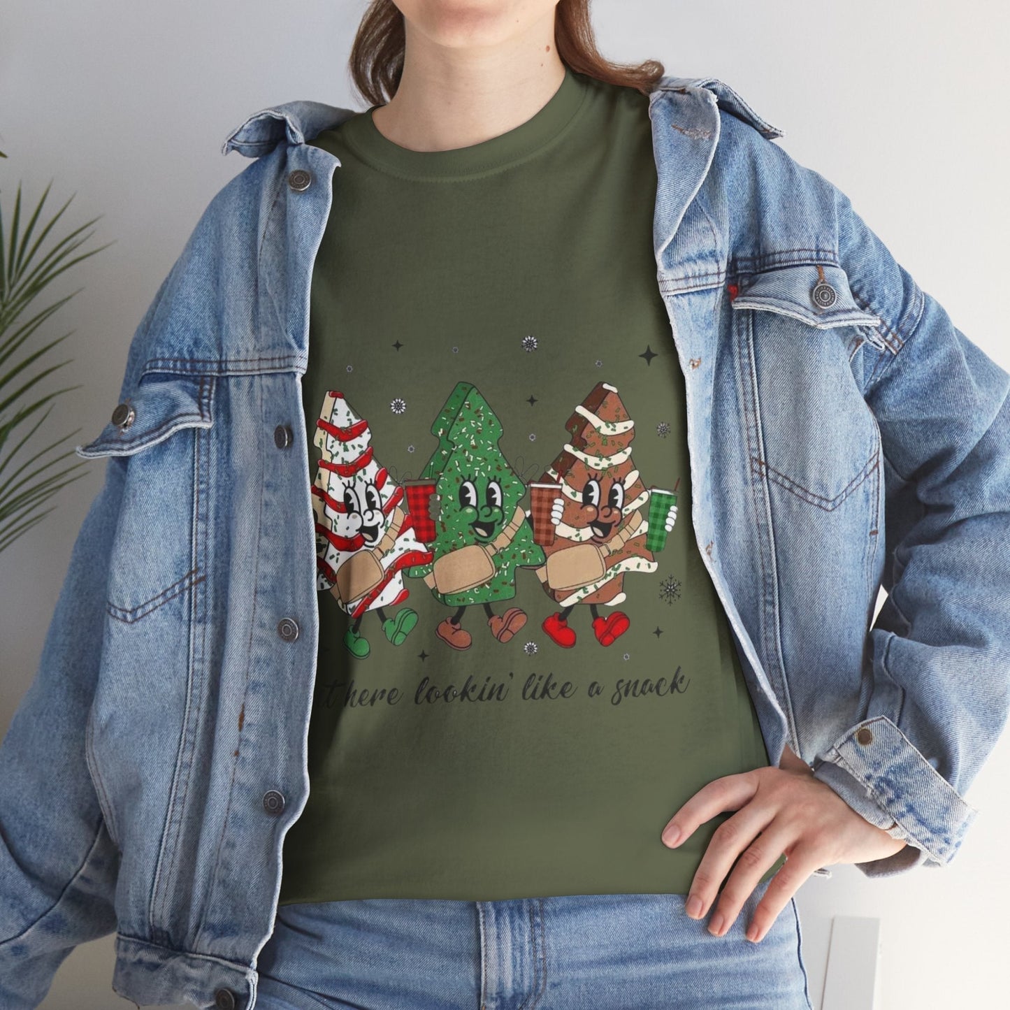 Festive "Out Here Looking Like a Snack" Christmas shirt with holiday designs.