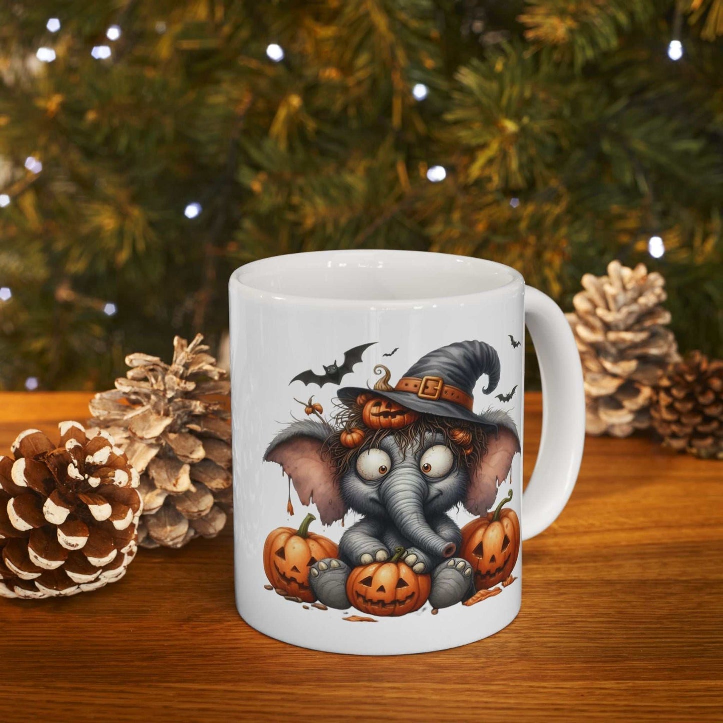 Funny elephant Halloween mug with witch hat and pumpkins, perfect spooky season gift.