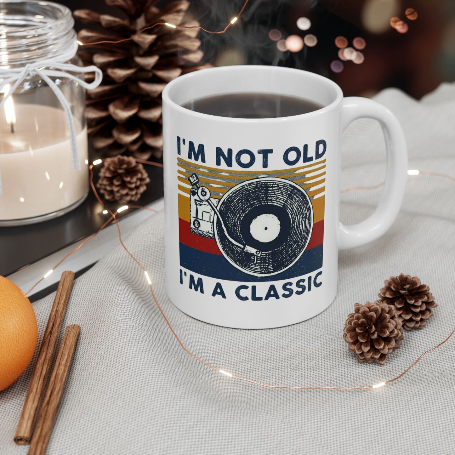 Vintage-inspired ceramic mug with "I'm Not Old, I'm A Classic" design, featuring vibrant colors; available in 11oz and 15oz.