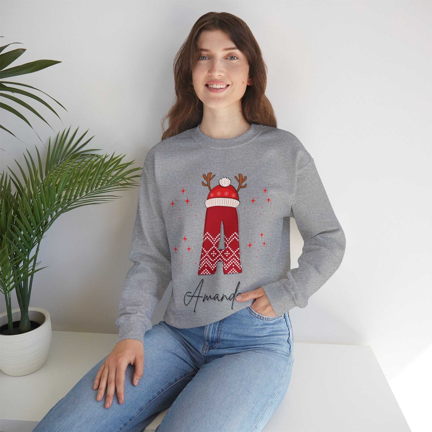 Family Christmas Name Sweatshirt with festive design, personalized for holiday celebrations.