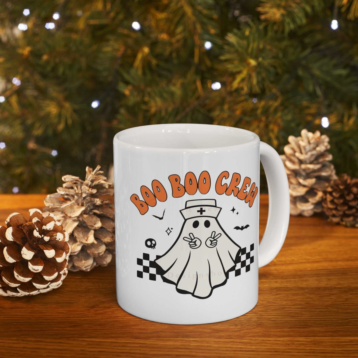 Ceramic coffee mug with "Boo Nurse Crew" Halloween design featuring a cute ghost wearing a nurse cap, perfect for spooky nurse-themed gifts.