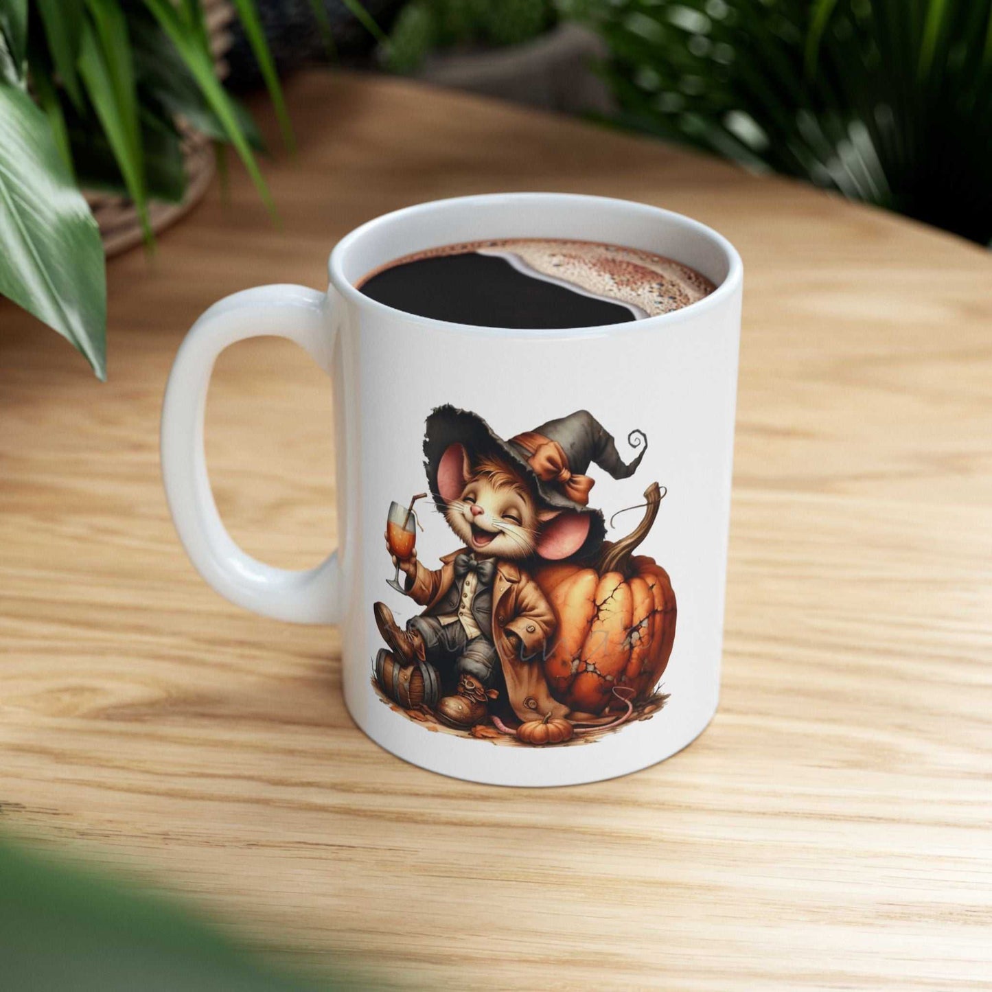 Ceramic coffee mug with a Halloween-themed design featuring a funny mouse and pumpkin.