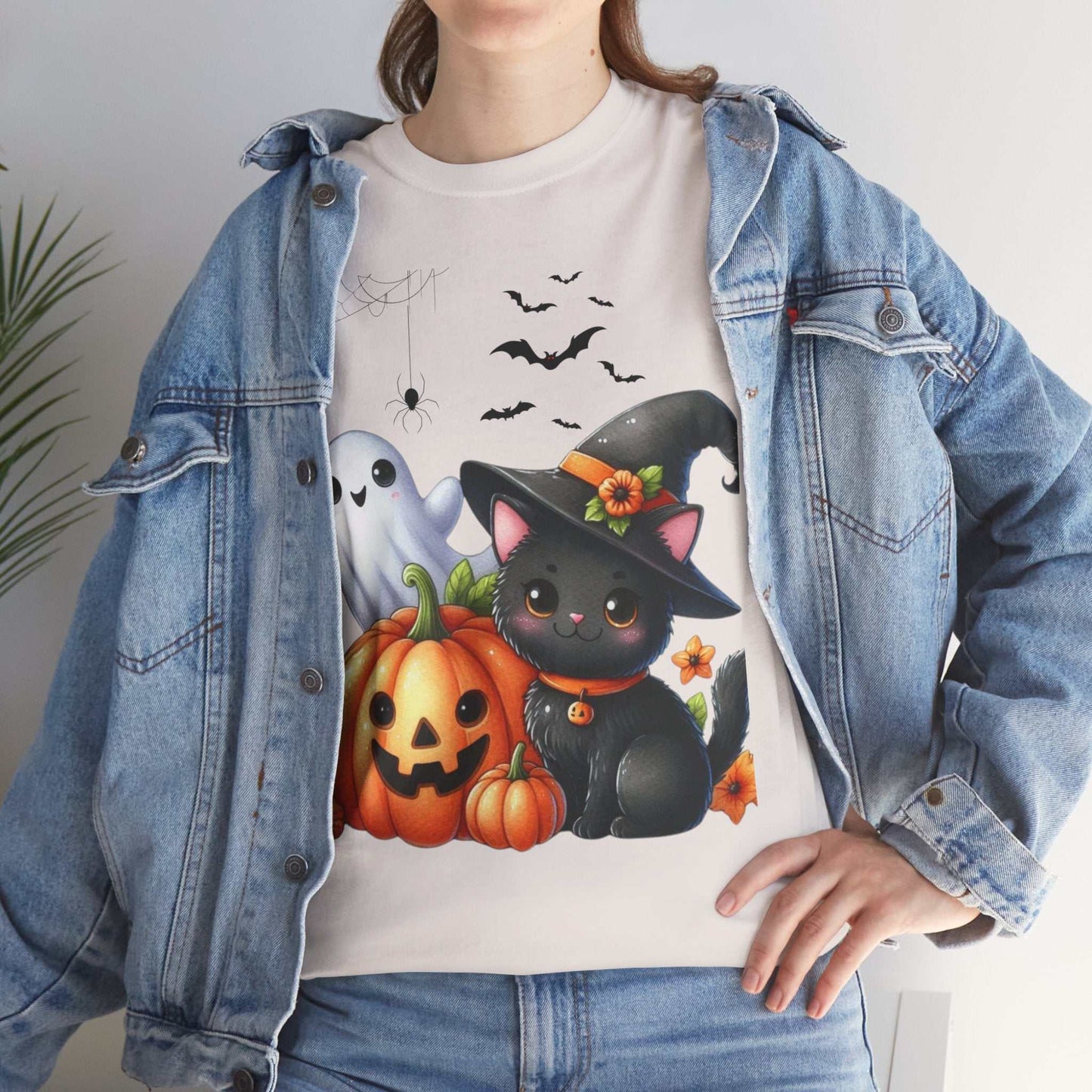 Halloween Cat Kids Shirt featuring a cute black cat, pumpkin, and ghost design; perfect for autumn festivities.