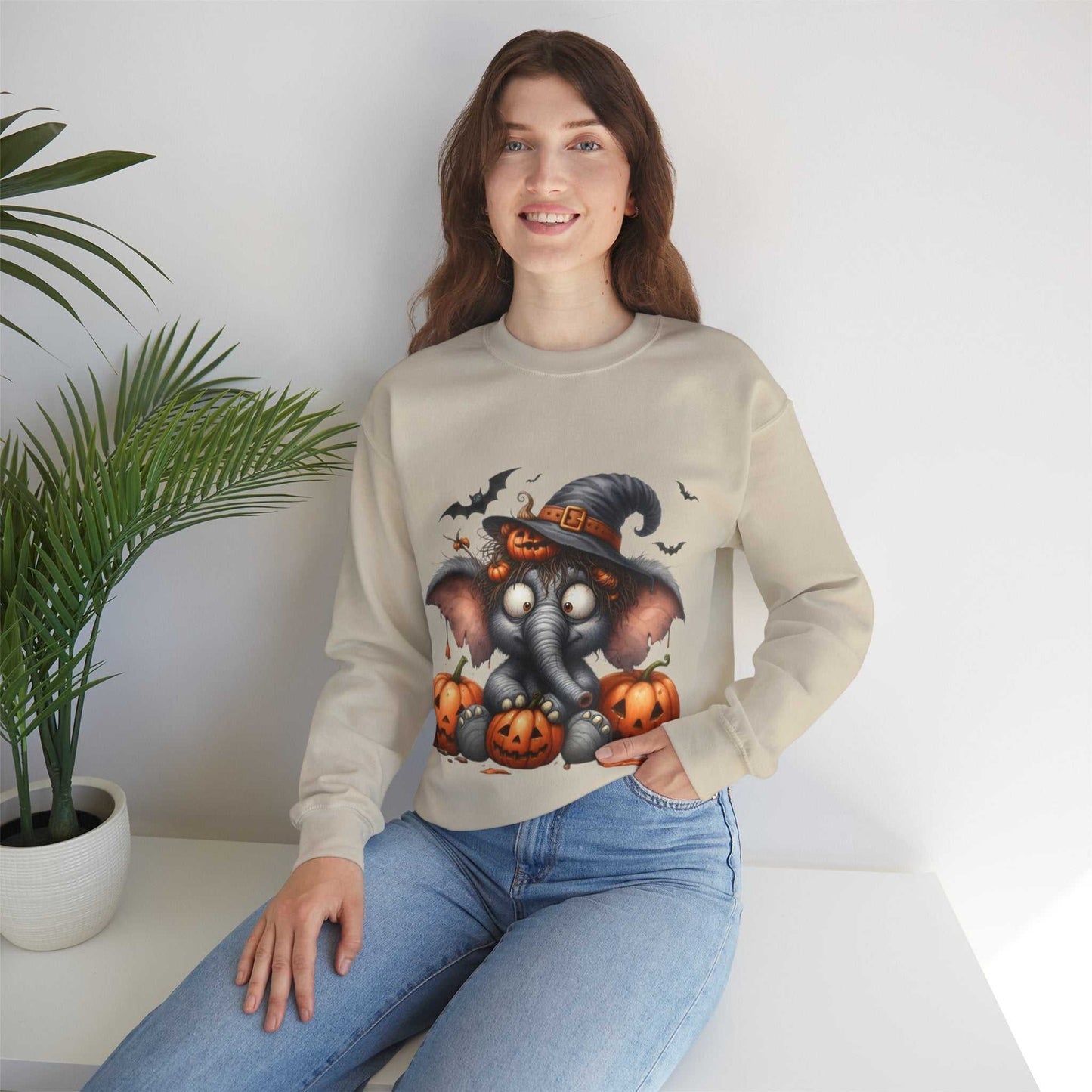 Funny Elephant Halloween Sweetshirt featuring cute elephant in witch hat with pumpkins, perfect for Halloween lovers.