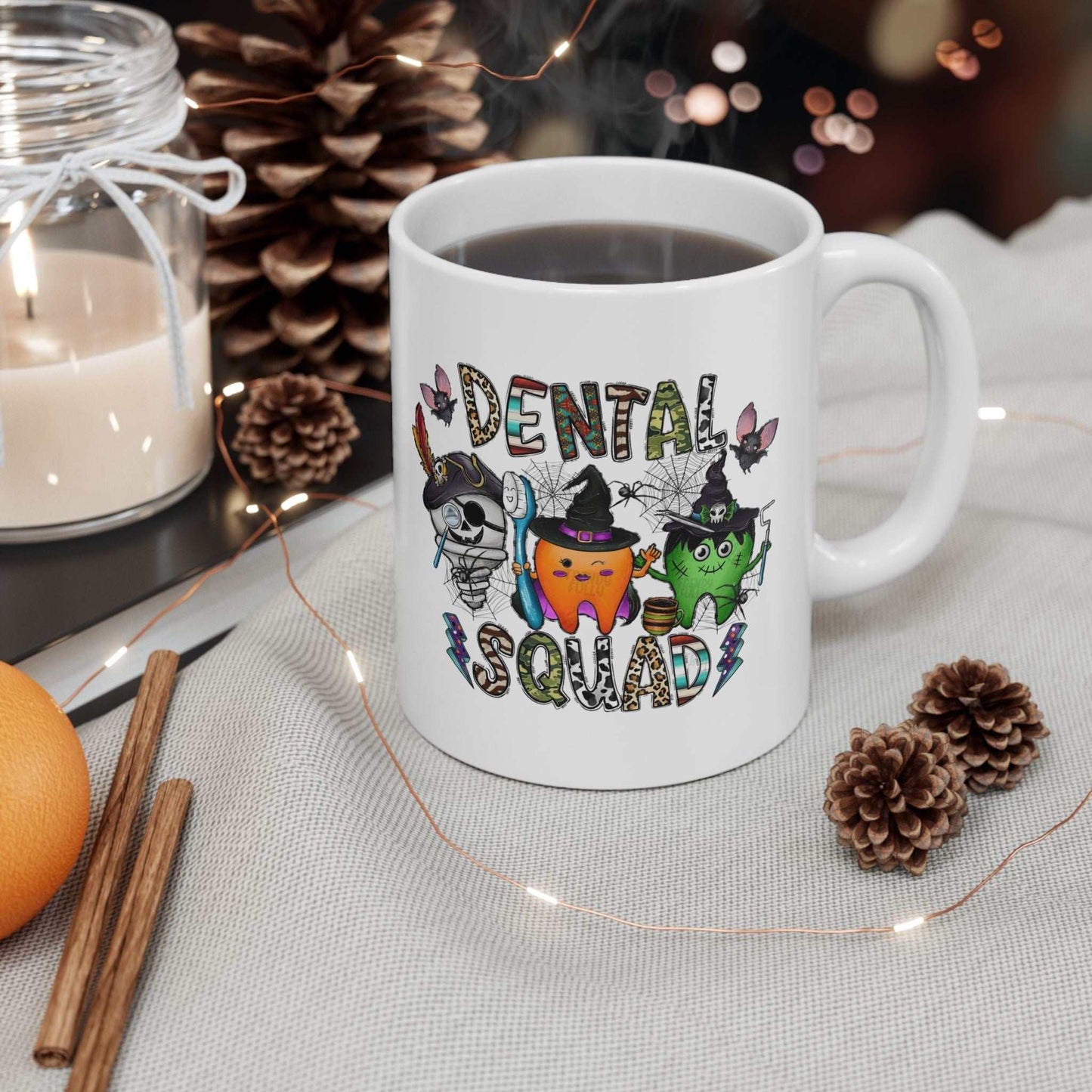 Dental Halloween mug with colorful tooth design in a festive setting.