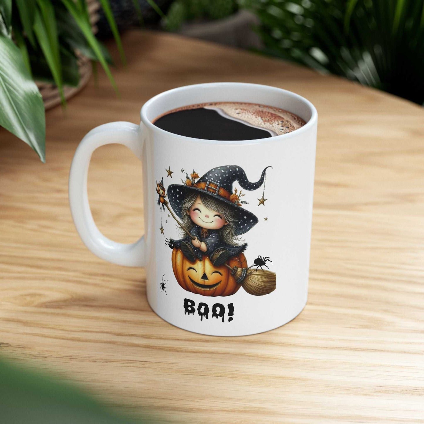 Halloween girl mug with a cute ghost design featuring a witch on a pumpkin, perfect for spooky season.