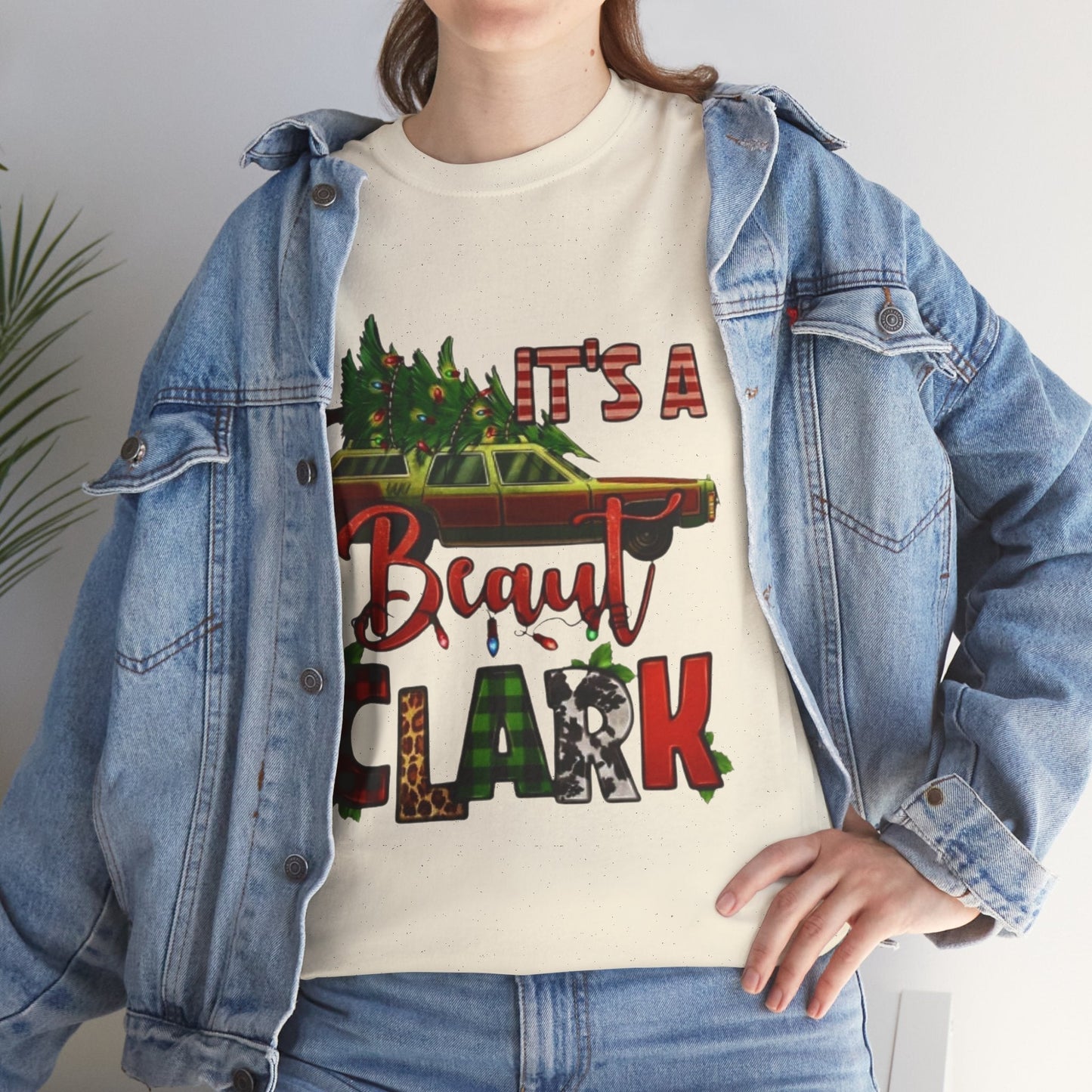 Retro "It's A Beaut Clark" Christmas shirt featuring vintage design inspired by National Lampoon's Christmas Vacation, perfect holiday gift.