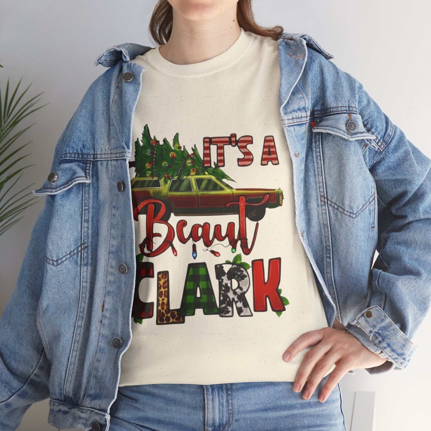 Retro "It's A Beaut Clark" Christmas shirt featuring vintage design inspired by National Lampoon's Christmas Vacation, perfect holiday gift.