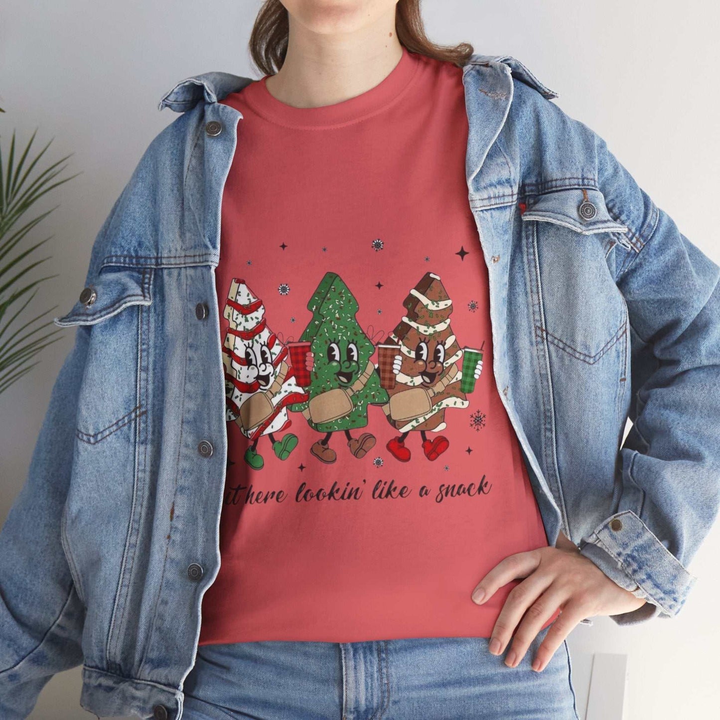 Fun Christmas-themed "Out Here Looking Like a Snack" shirt with festive snack characters, perfect holiday gift idea.