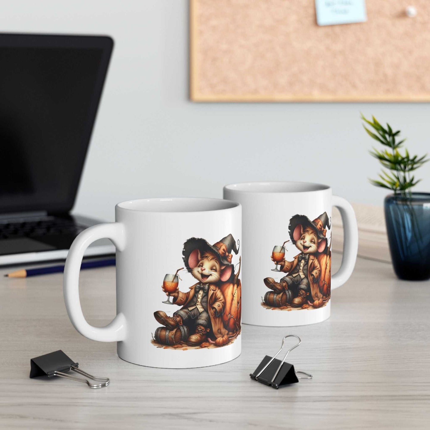Funny Mouse Halloween mugs on a desk, featuring a whimsical mouse design.