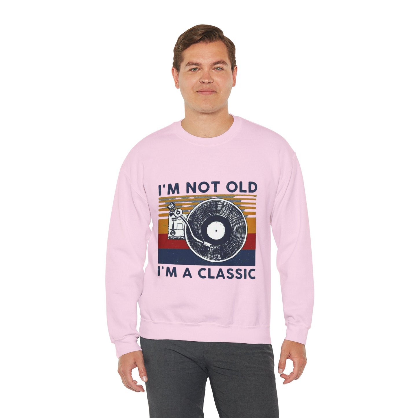 Unisex "I'm Not Old I'm a Classic" crewneck sweatshirt with vintage-inspired design, perfect for nostalgic style and comfort.
