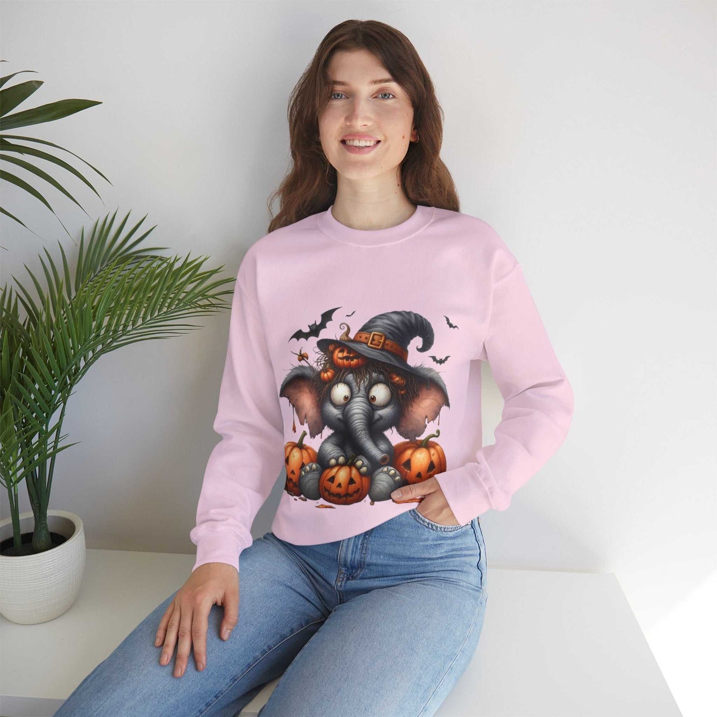 Funny Elephant Halloween sweatshirt with cute elephant in witch hat and pumpkins design.