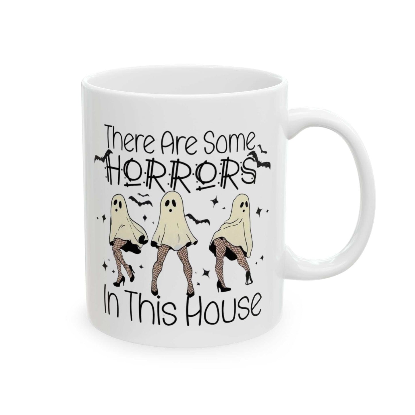 Ceramic coffee mug with "There Are Some Horrors In This House" Halloween design, ghosts, 11oz and 15oz sizes, durable and vivid colors.