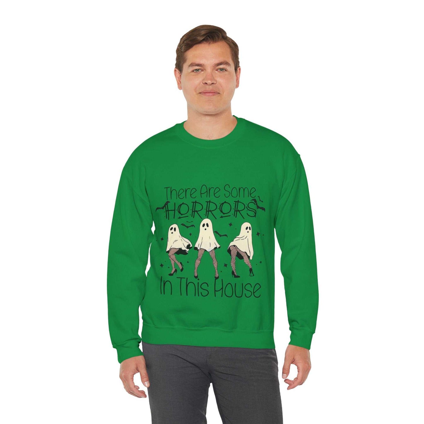 Funny Halloween sweatshirt with ghost design and text "There's Some Horrors in This House" on a green background.
