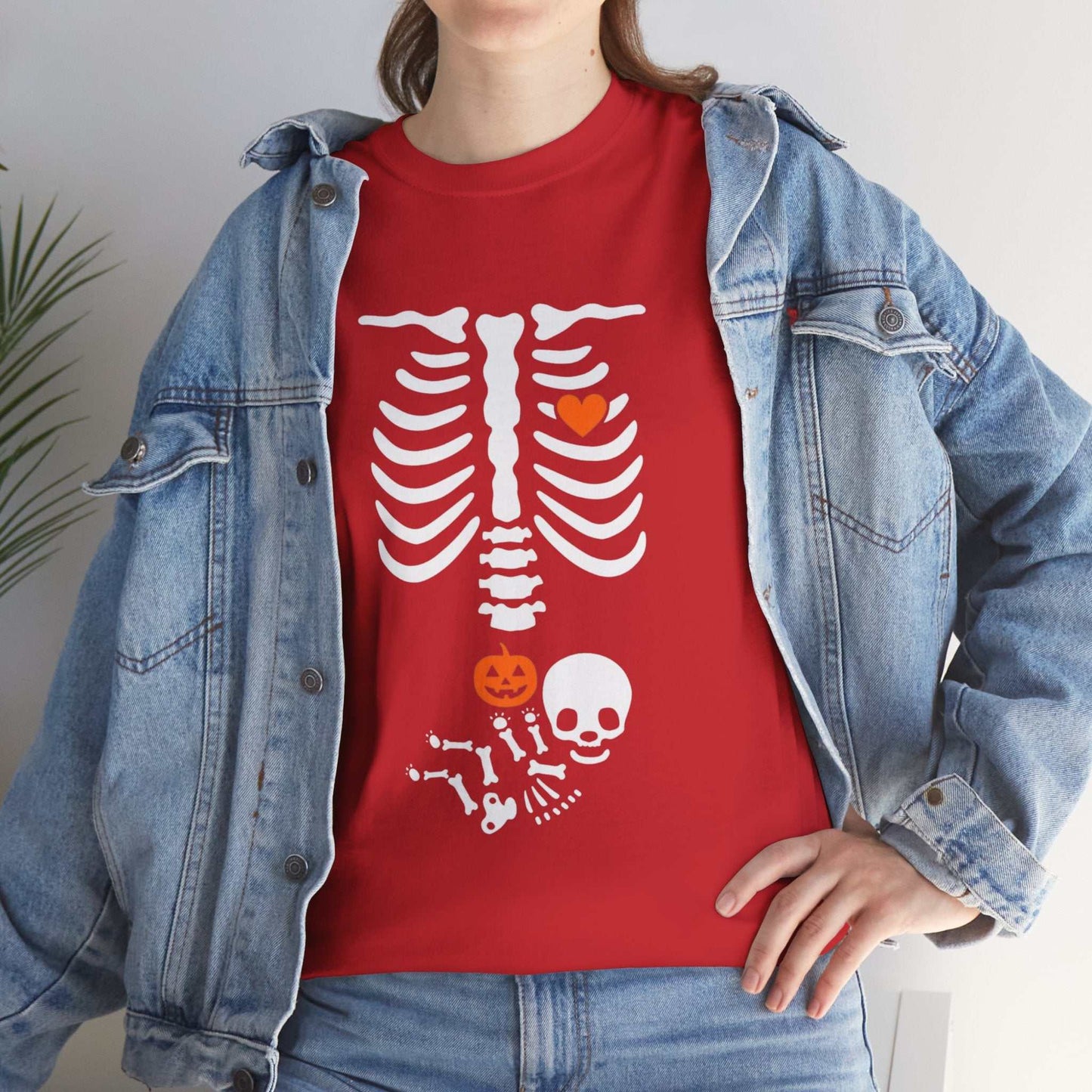 Halloween maternity shirt with a skeleton design, ideal for pregnancy reveals and new moms.