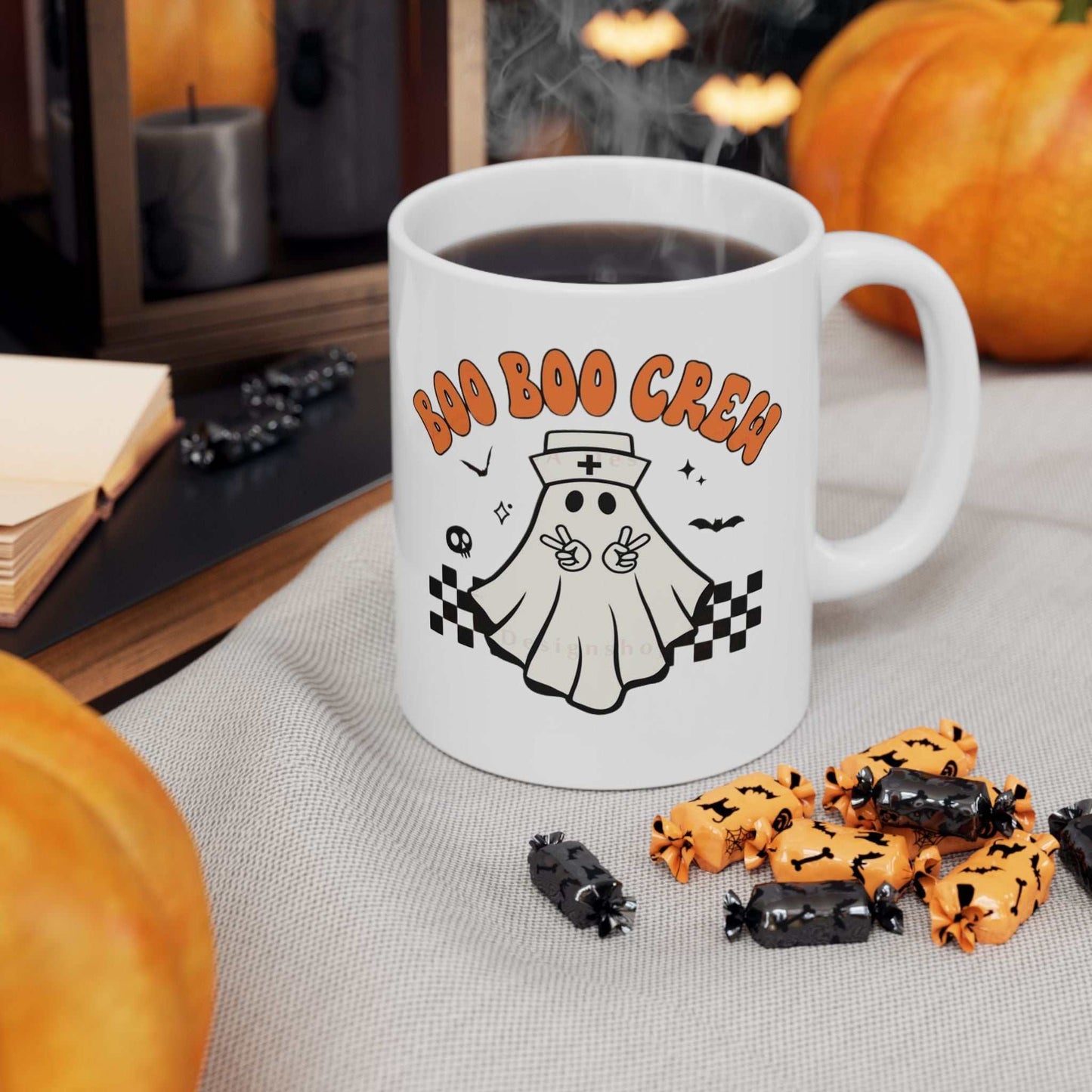 Ceramic coffee mug with "Boo Nurse Crew Halloween" design featuring a cute nurse ghost, ideal for Halloween-themed gifts.