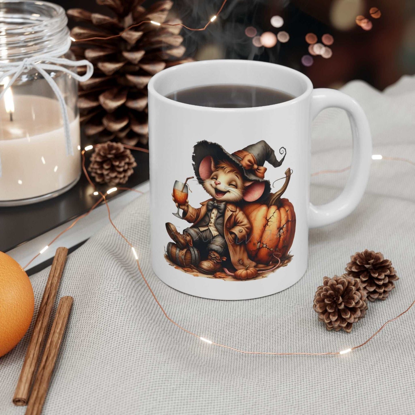 Funny Mouse Halloween mug with a cute mouse in a witch hat, surrounded by a pumpkin, perfect for spooky season.