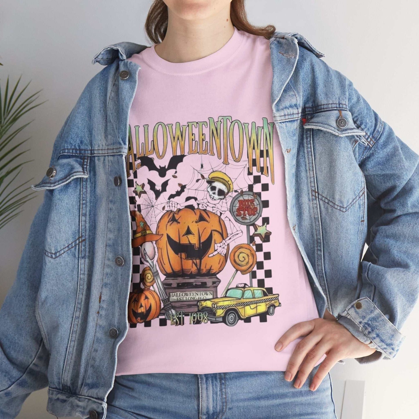 Retro Halloweentown Shirt with Halloween graphics and denim jacket ensemble.