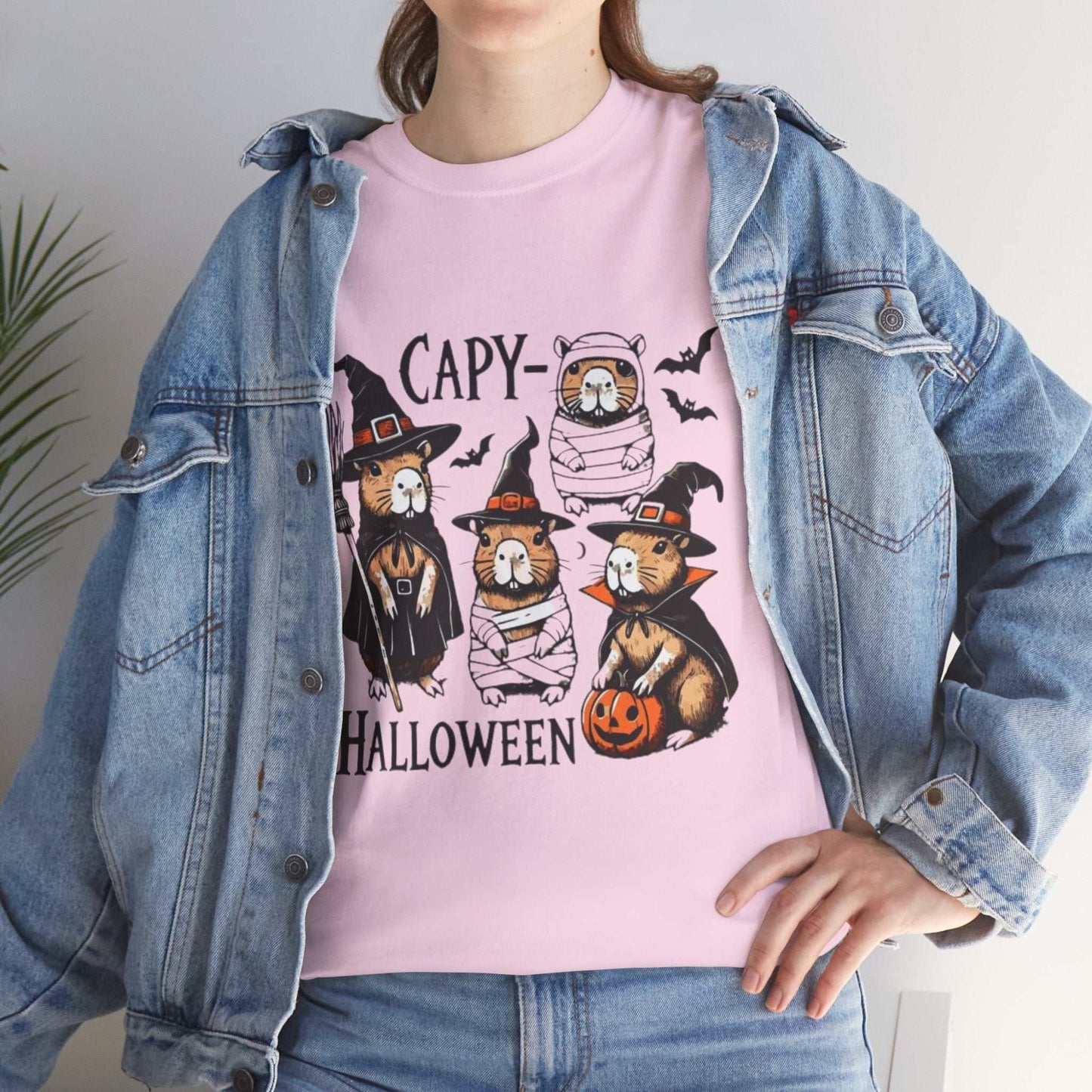 Unisex Halloween Capybara Shirt with spooky capybaras and pumpkins, perfect for costume and gift.
