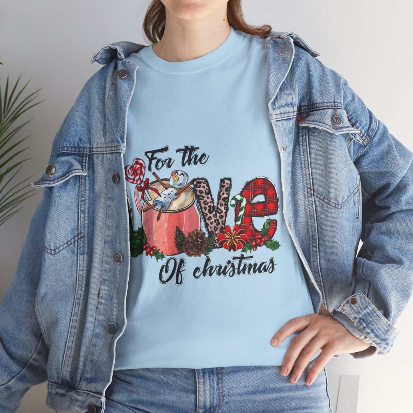 For The Love Of Christmas Shirt with festive design and denim jacket.