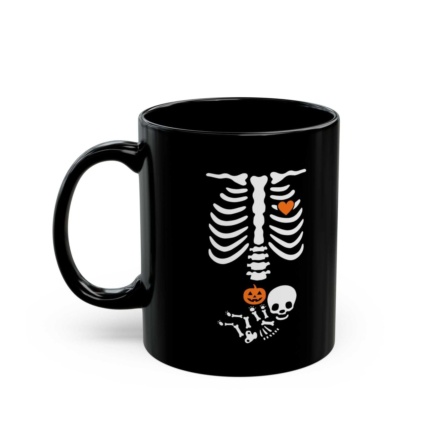 Black ceramic mug with skeleton and pumpkin design, ideal for Halloween maternity announcements.