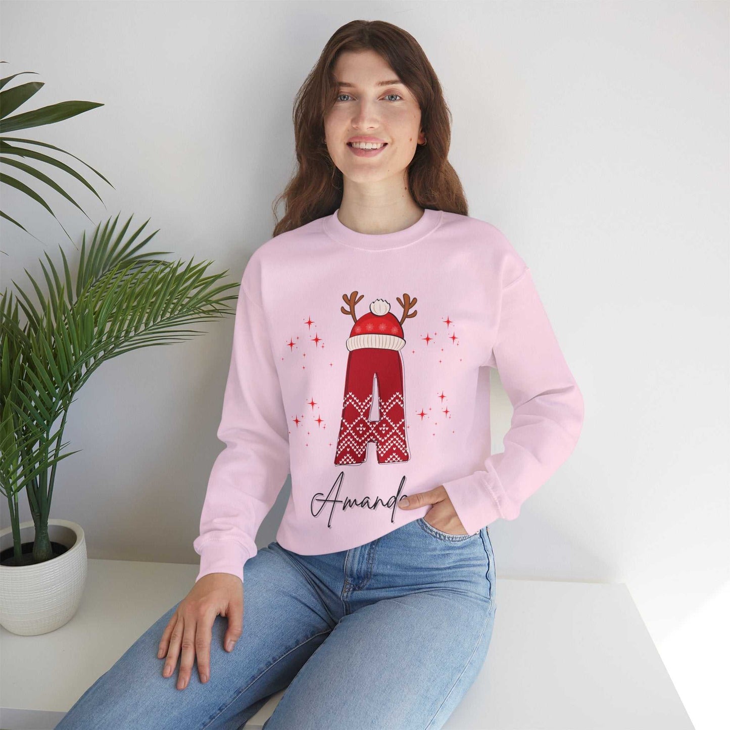 Family Christmas Name Sweatshirt with festive design, personalized with name, ideal for holiday celebrations.