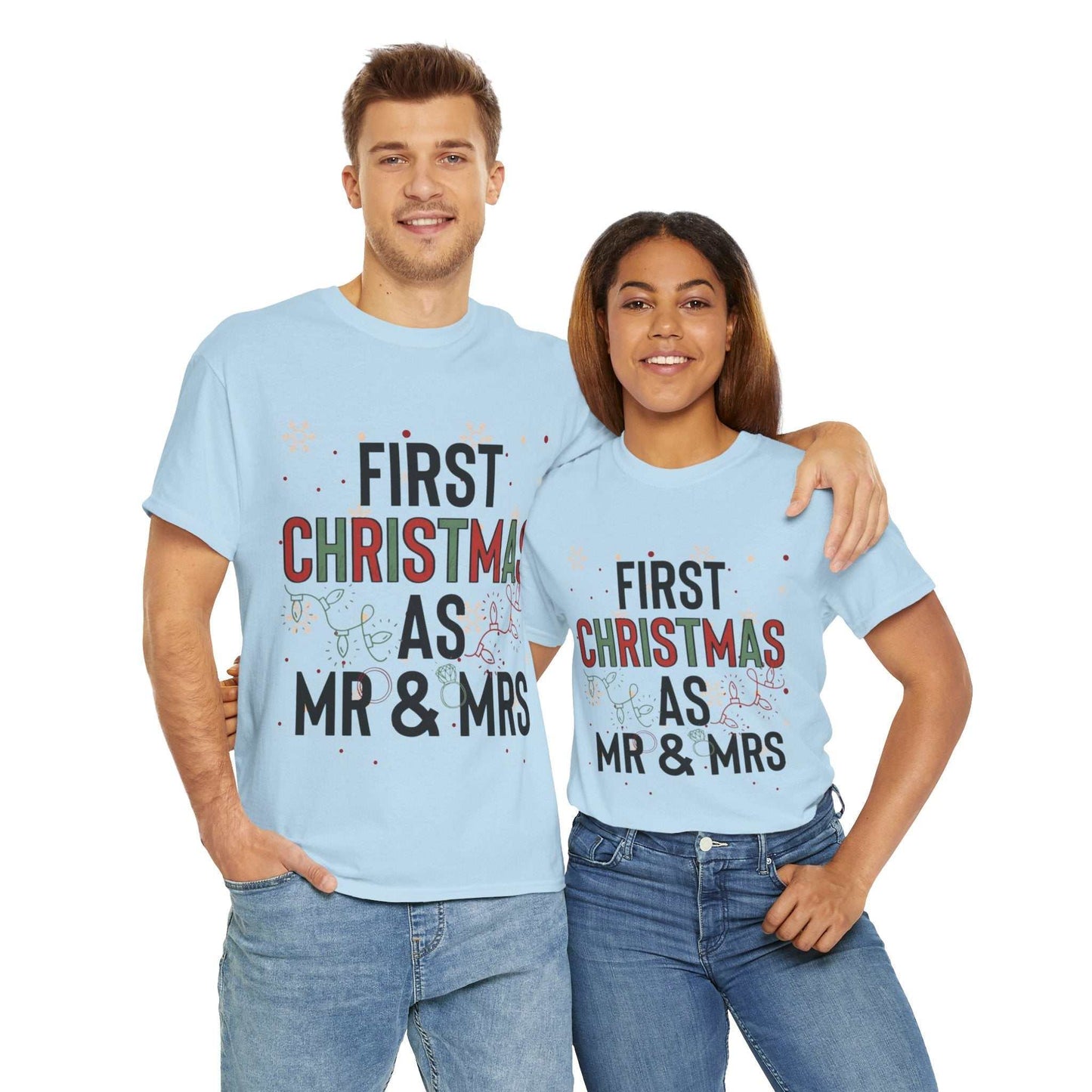 Couple wearing matching "First Christmas As Mr and Mrs" shirts, perfect newlywed Christmas gift.