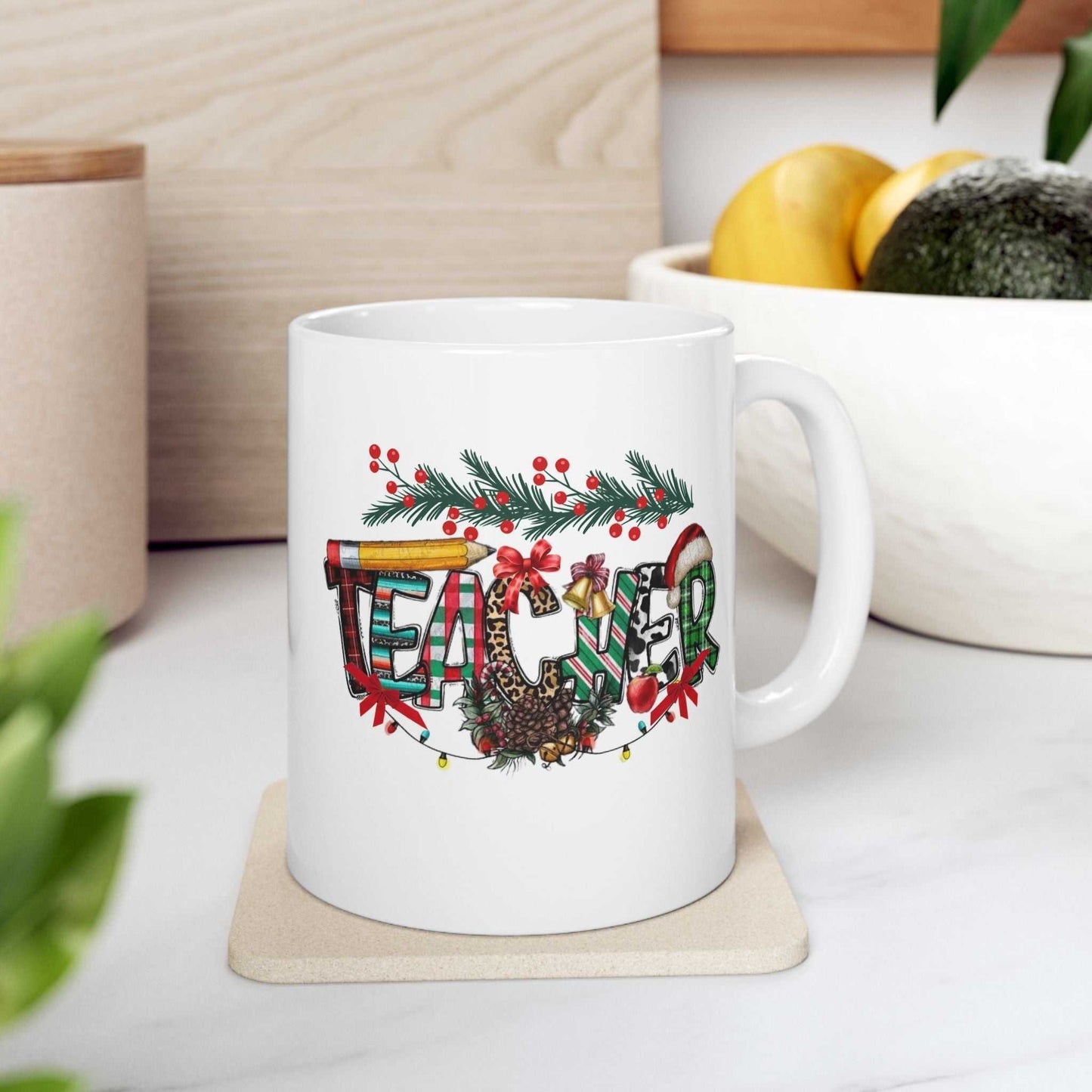 Ceramic teacher Christmas mug with festive design, ideal Christmas gift.