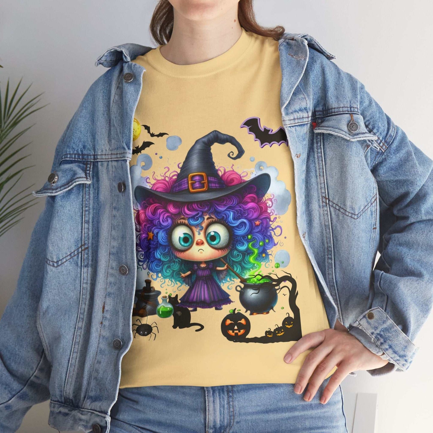 Halloween girl ghost shirt featuring cute witch design, spooky and colorful for kids.
