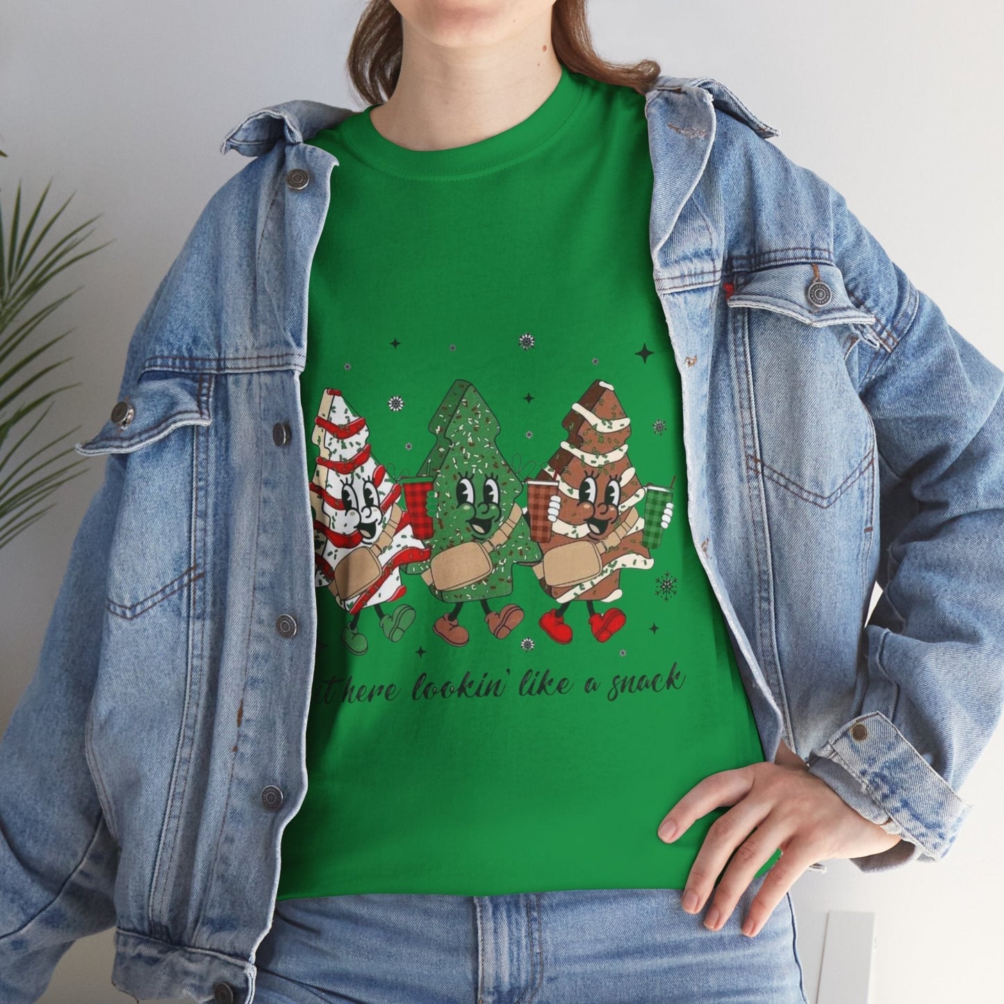 Festive green Christmas-themed "Out Here Looking Like a Snack" shirt with playful holiday design.