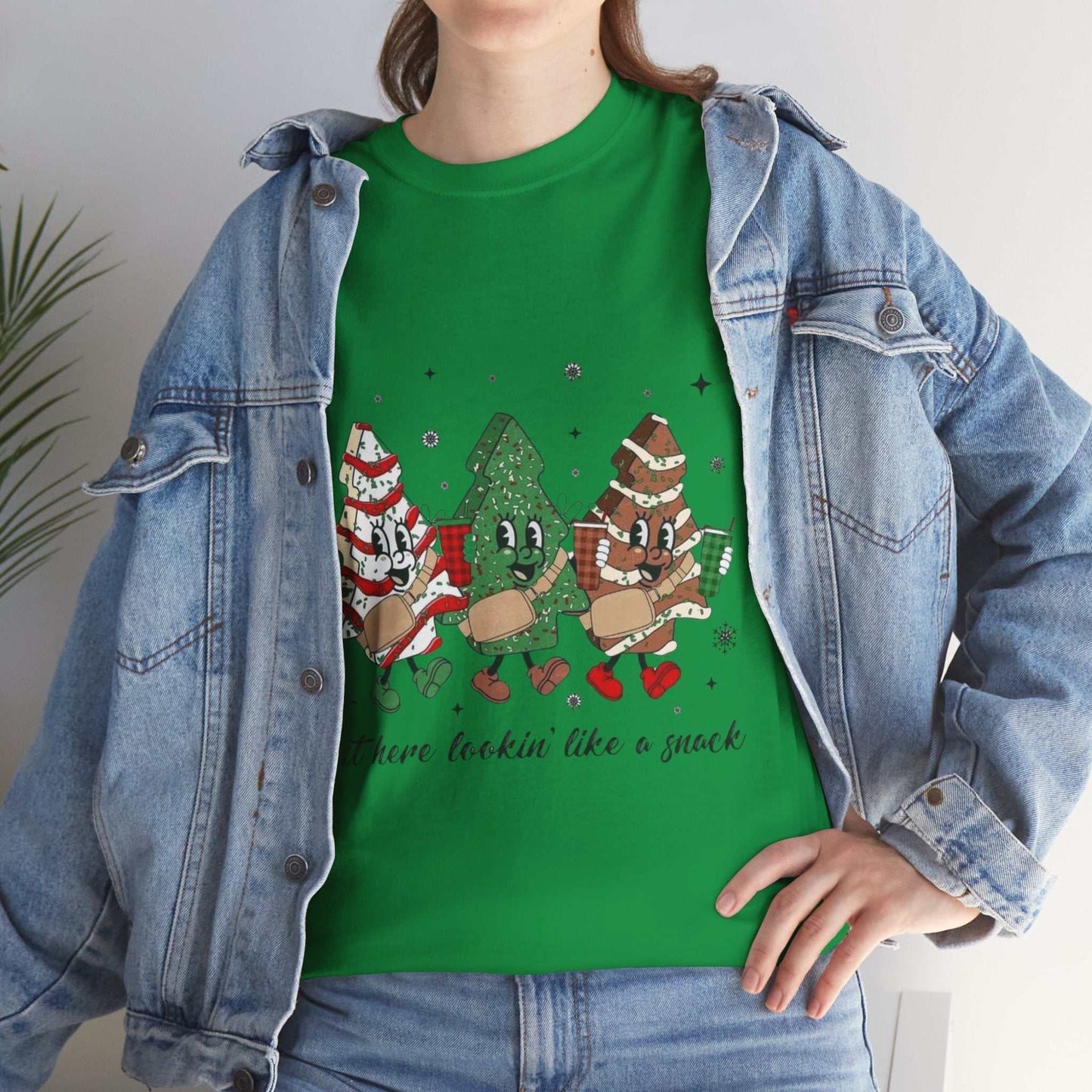 Festive green Christmas-themed "Out Here Looking Like a Snack" shirt with playful holiday design.