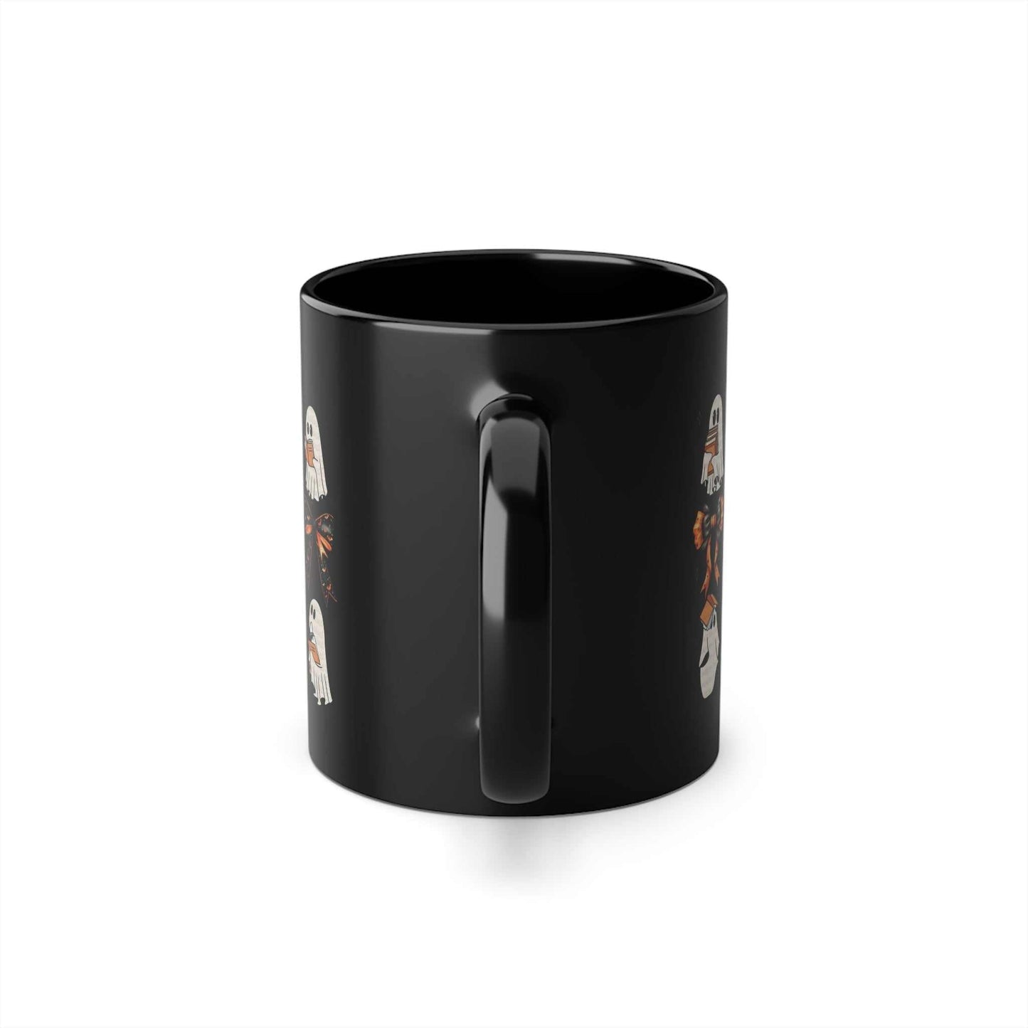 Black ceramic mug featuring a book ghost design, perfect for Halloween, with a glossy finish and C-shaped handle for easy gripping.