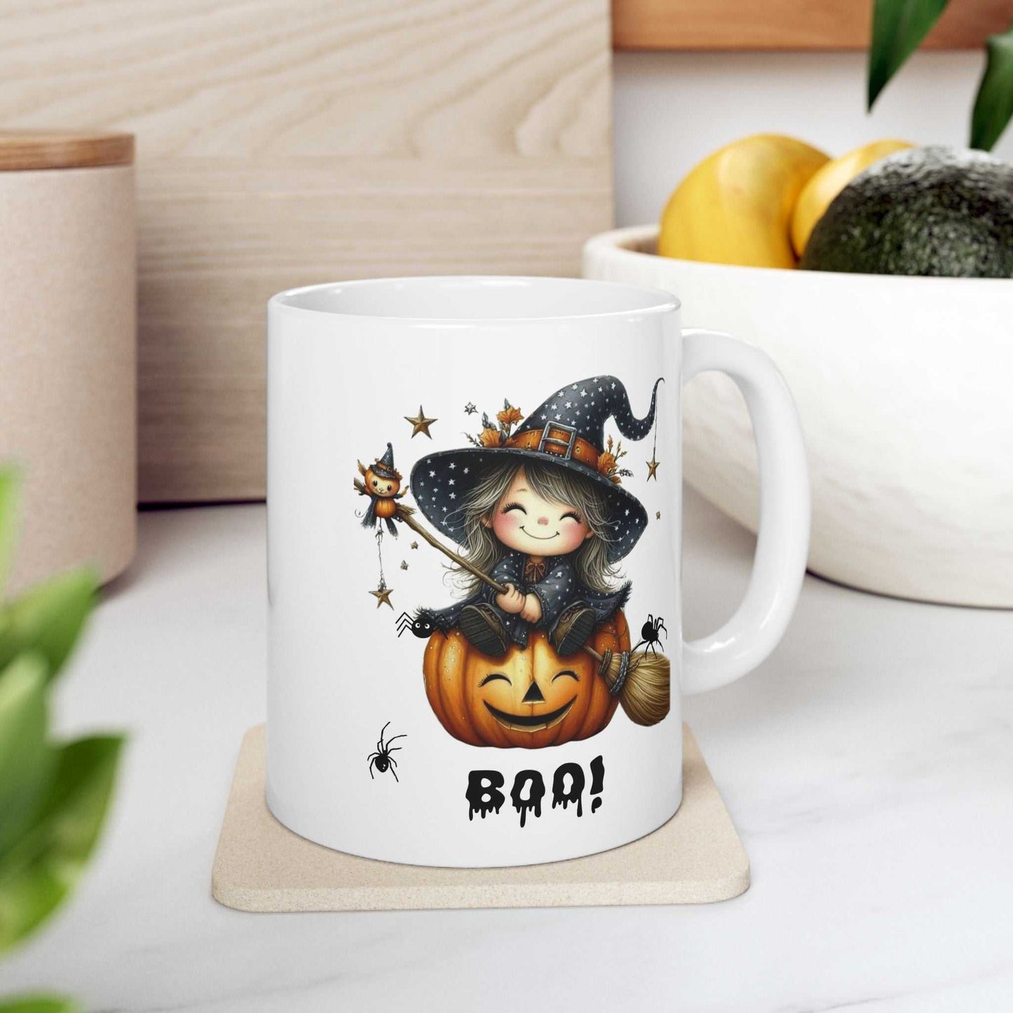 Halloween-themed girl ghost mug with a cute witch on a pumpkin design, perfect for kids and spooky season.
