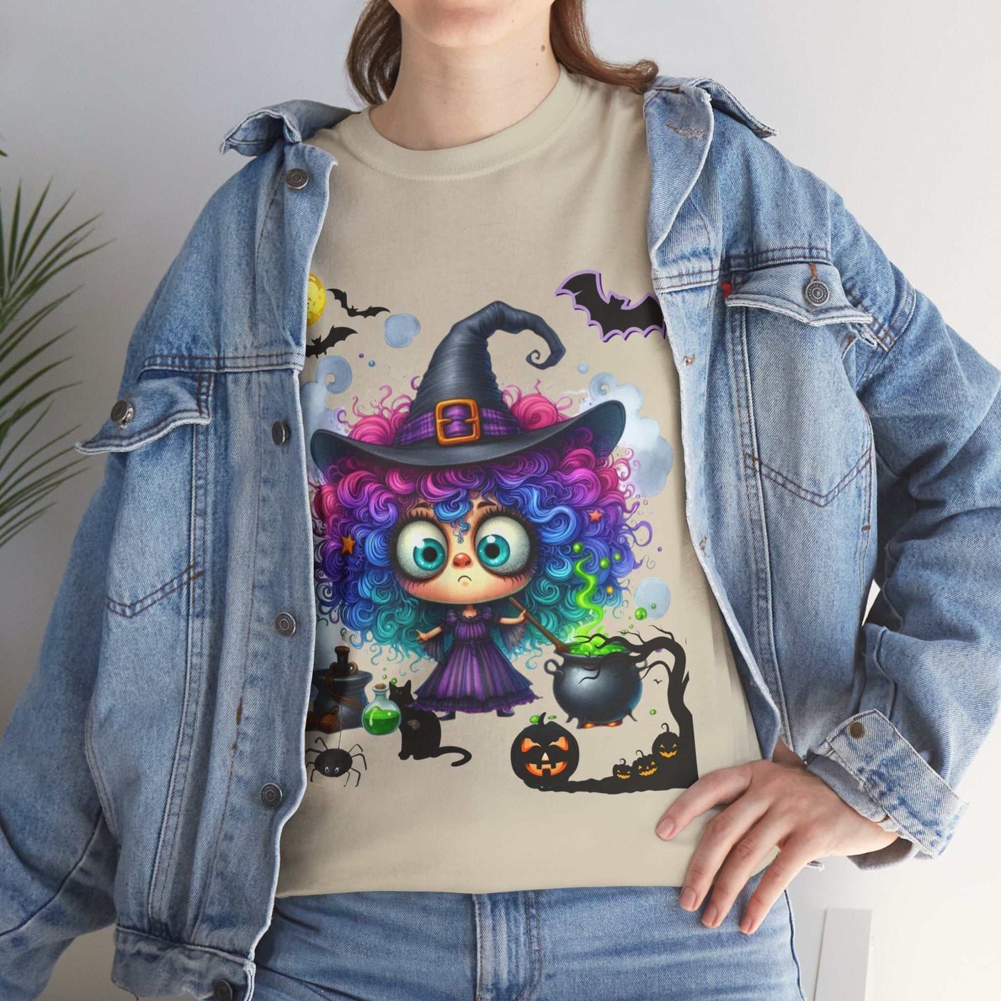 Halloween girl ghost shirt featuring a cute cartoon character in a witch costume, perfect for spooky season.