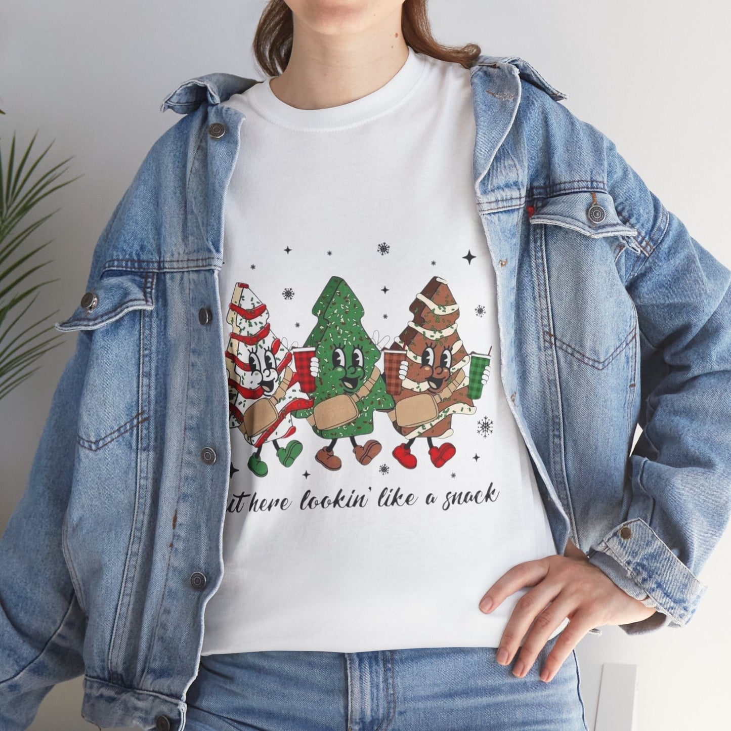 Unisex t-shirt with Christmas-themed snack design, perfect for holiday parties.